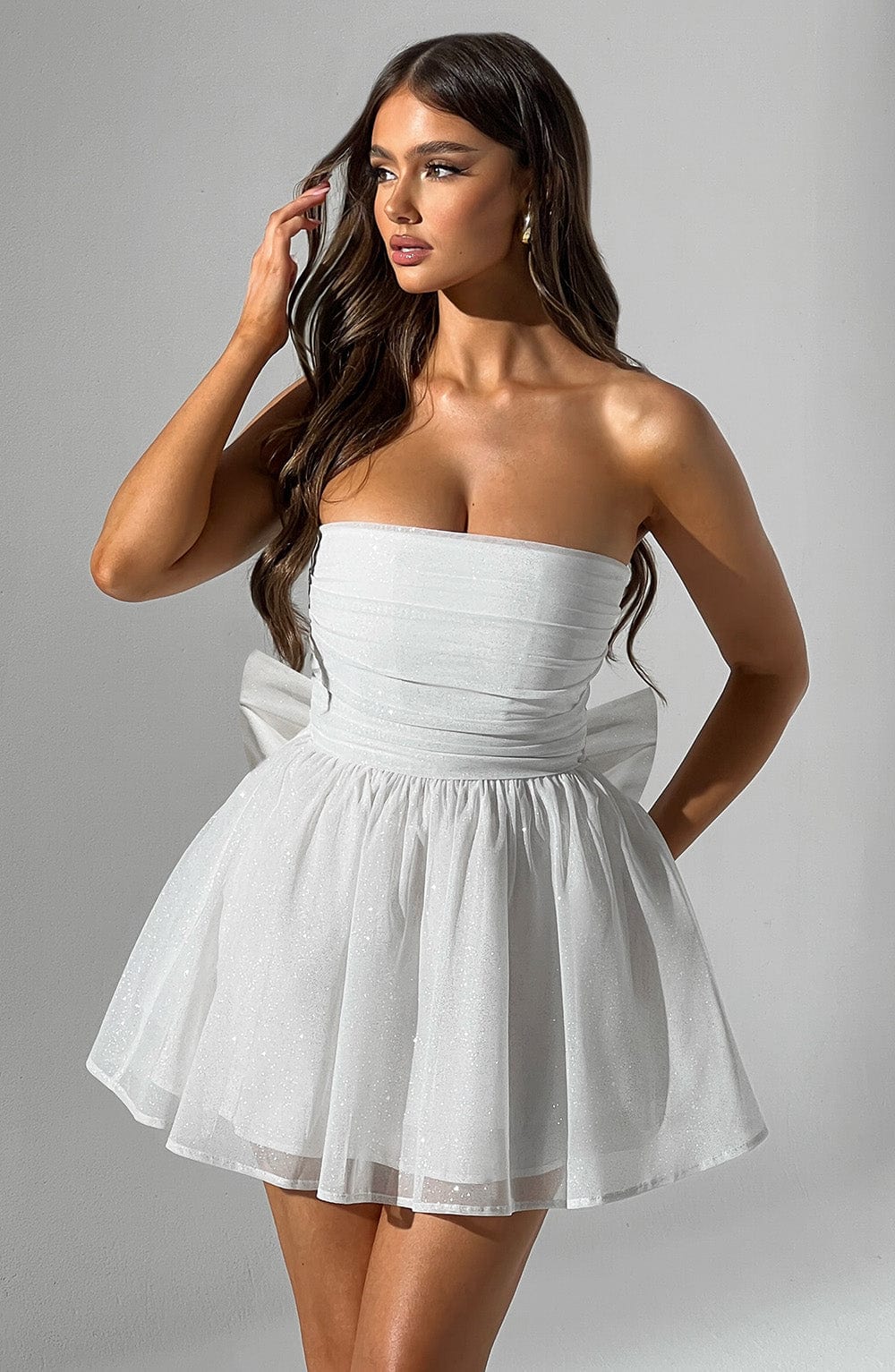 Modern strapless A-line mini cocktail dress, an elegant choice for parties.