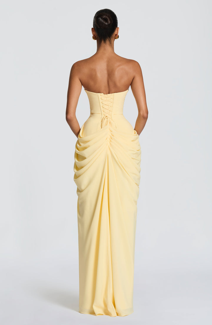Sleek strapless bodycon maxi dress for women, a corset-style evening gown perfect for prom or formal events.