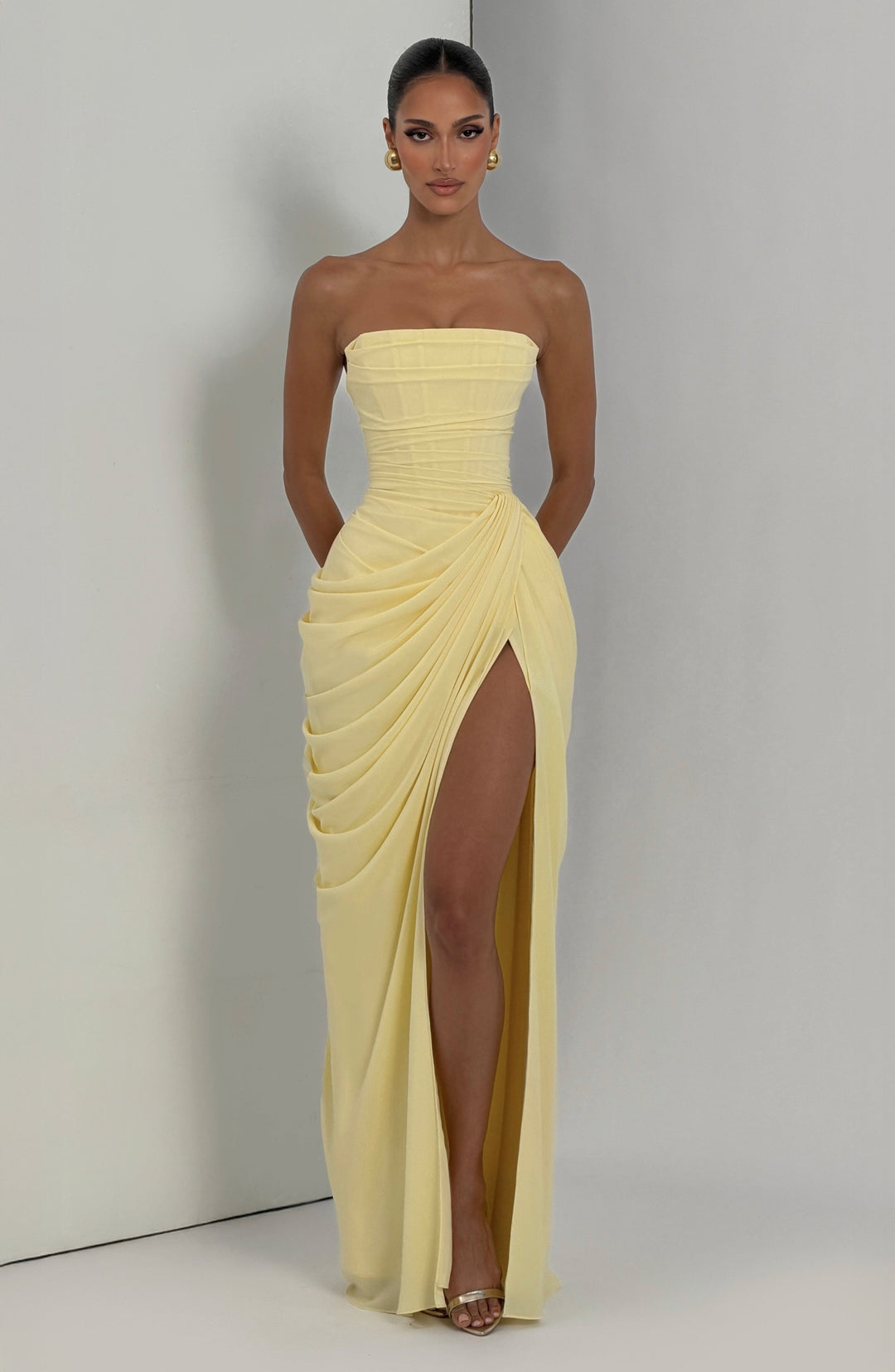 Glamorous women's strapless corset bodycon evening maxi dress, creating a beautiful sculpted silhouette.