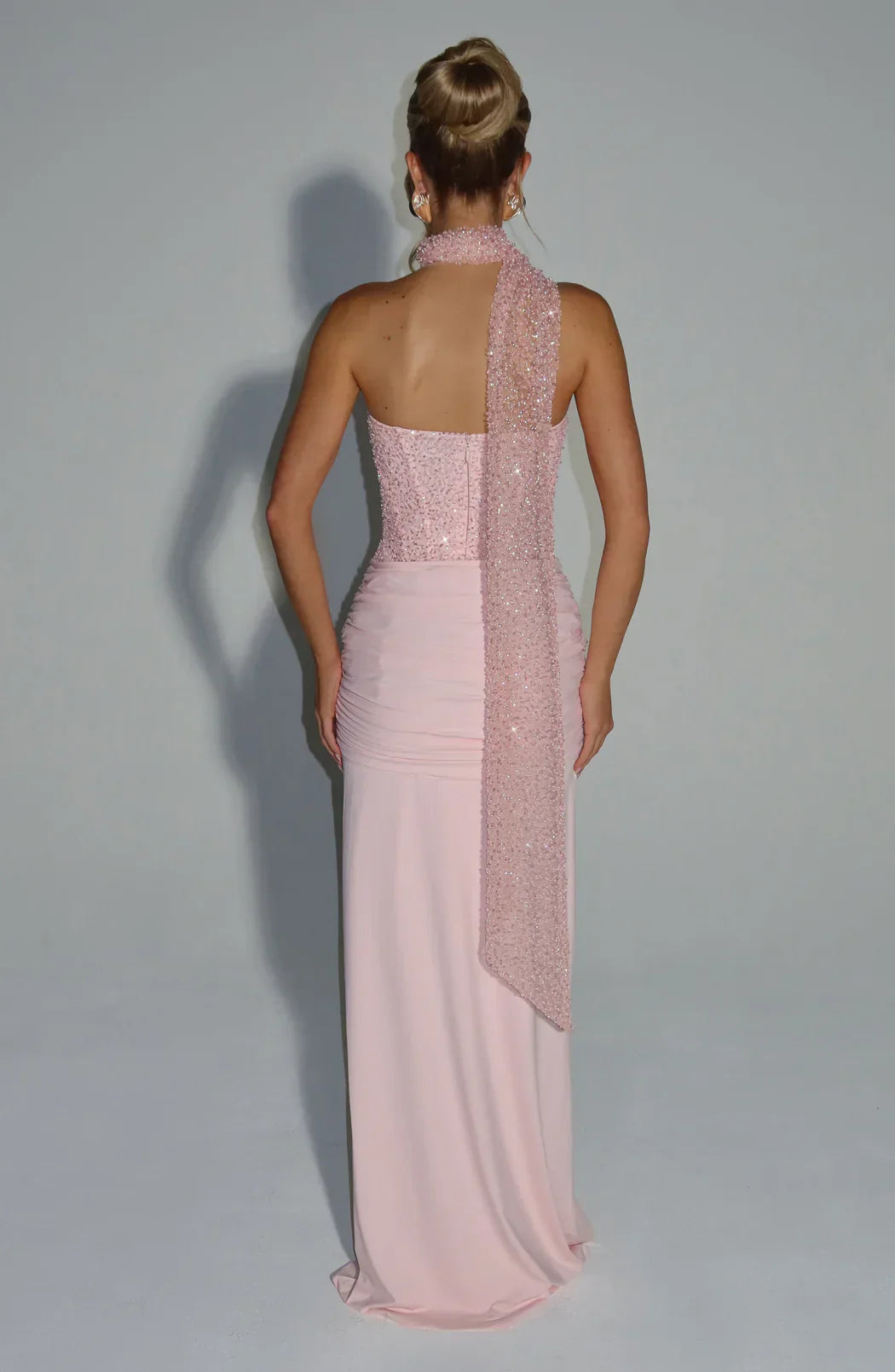Figure-flattering women's strapless corset maxi dress for elegant evening wear. Perfect for formal events.