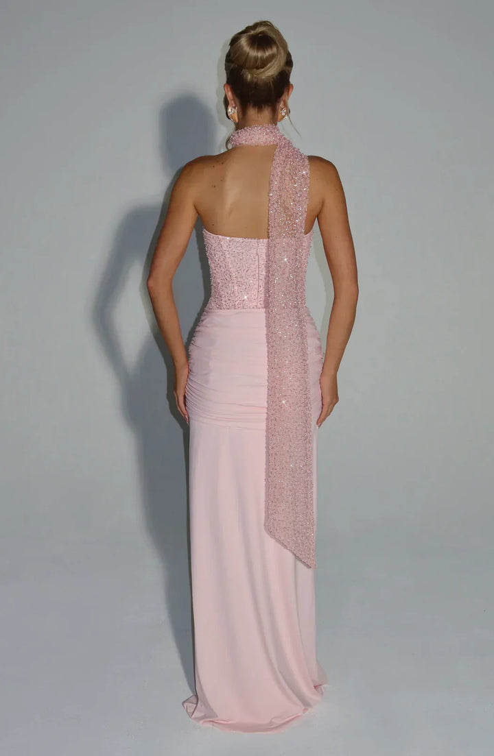 Figure-flattering women's strapless corset maxi dress for elegant evening wear. Perfect for formal events.
