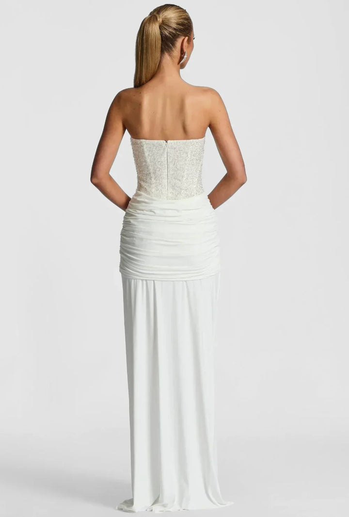 Brown elegant strapless corset maxi dress for women. Ideal formal evening wear & occasion dress.