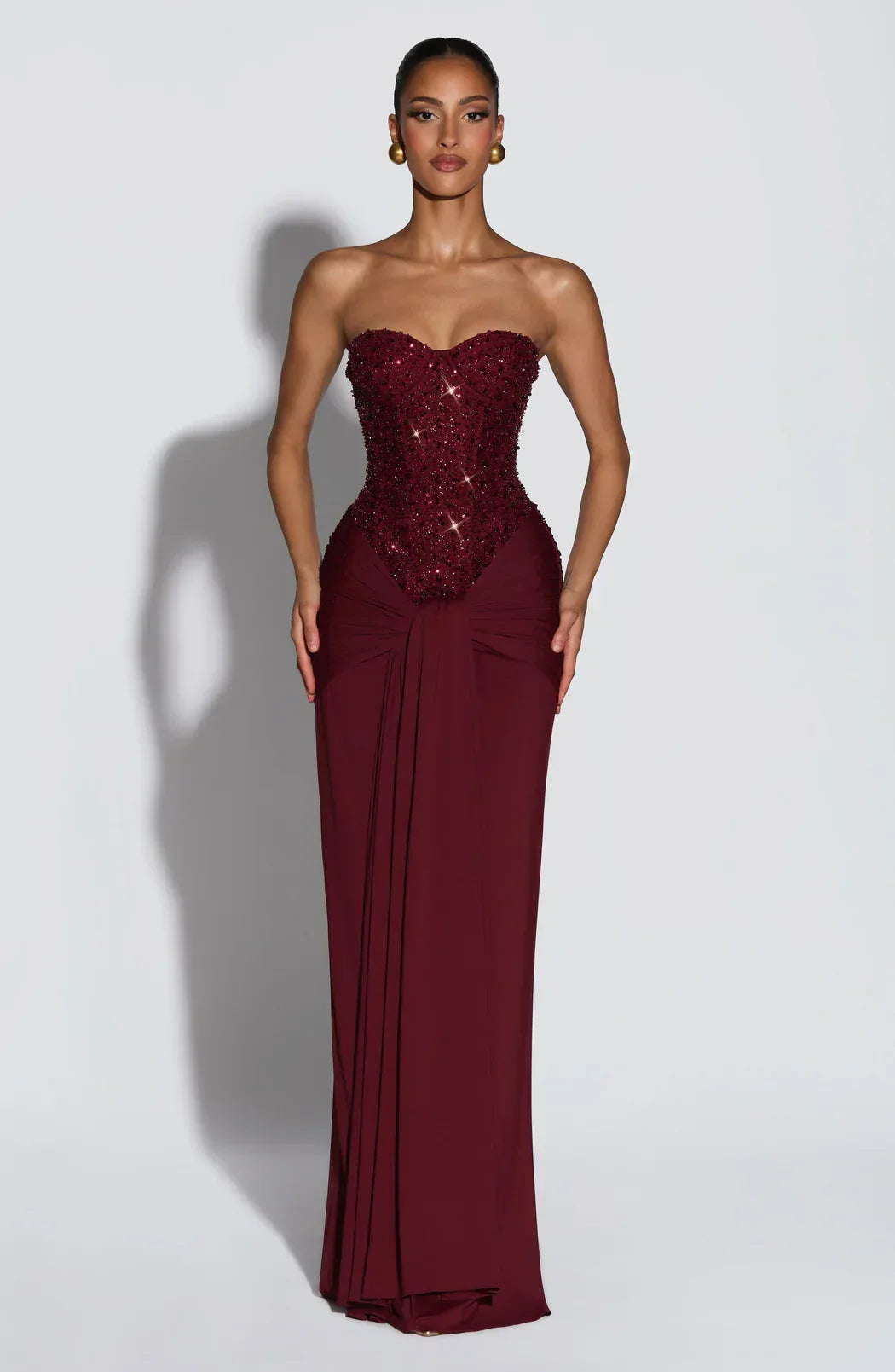 Red elegant strapless corset maxi dress for women. Ideal formal evening wear & occasion dress.