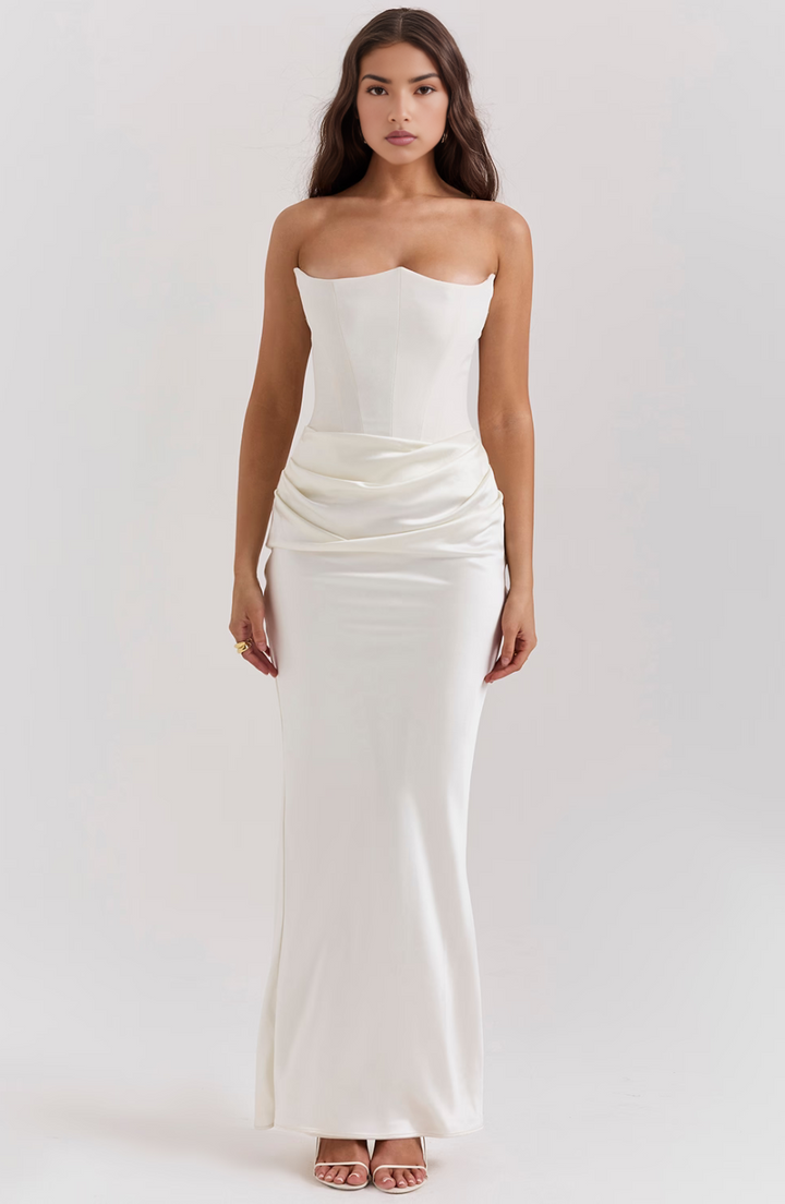Beautiful women's strapless evening dress with corset bodice and flowing maxi skirt. Perfect for formal wear.