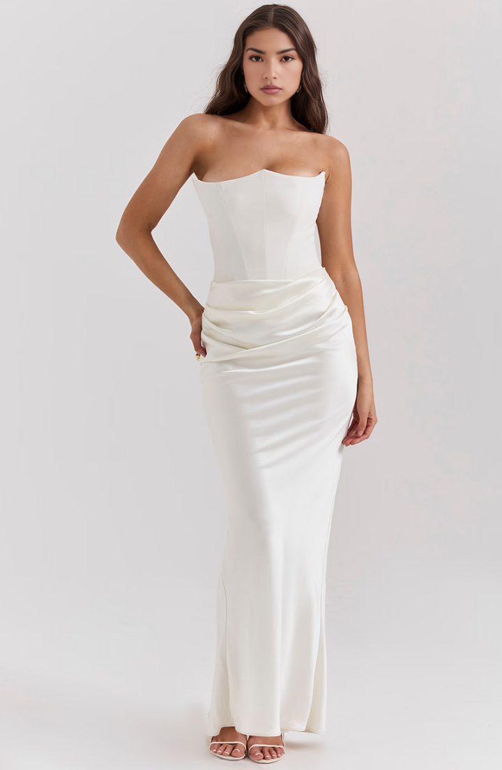 Modern women's elegant strapless maxi dress, featuring a supportive corset. Ideal for special events.