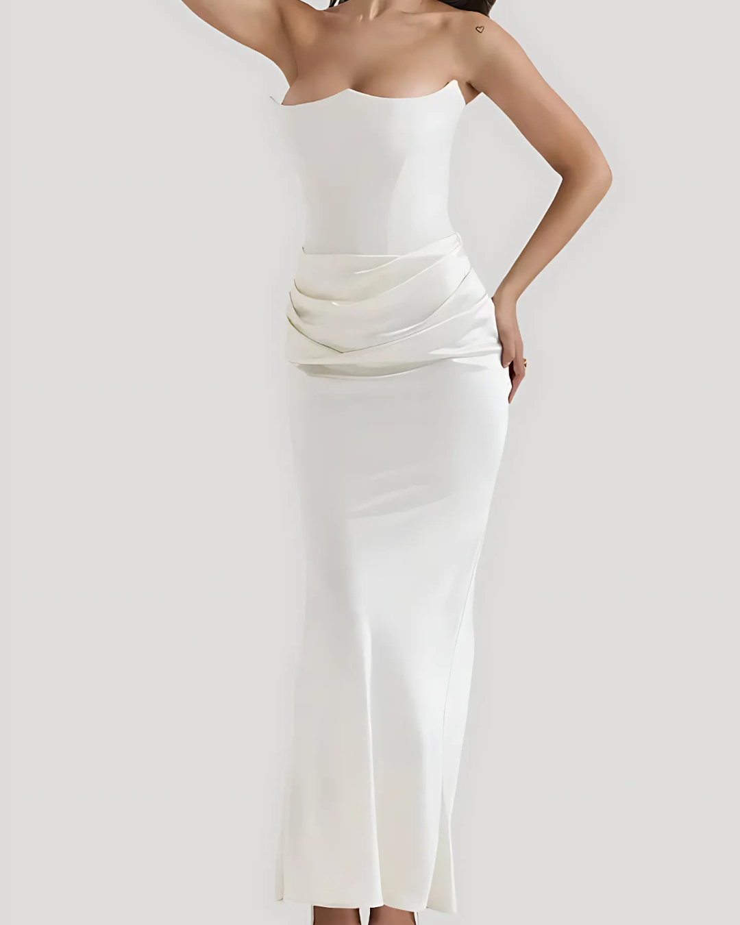 Luxurious women's strapless maxi dress with flattering drape, perfect wedding guest or formal event gown.