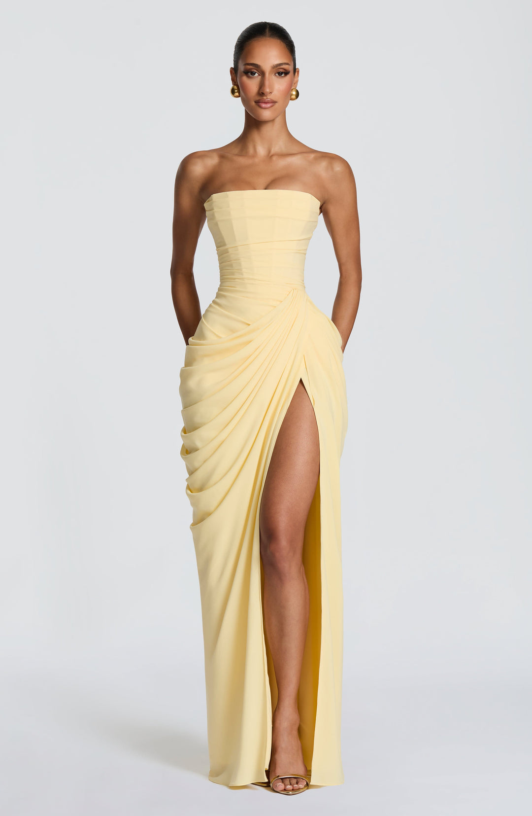 Elegant women's strapless maxi dress with a flattering ruched waist, perfect for formal events & parties.