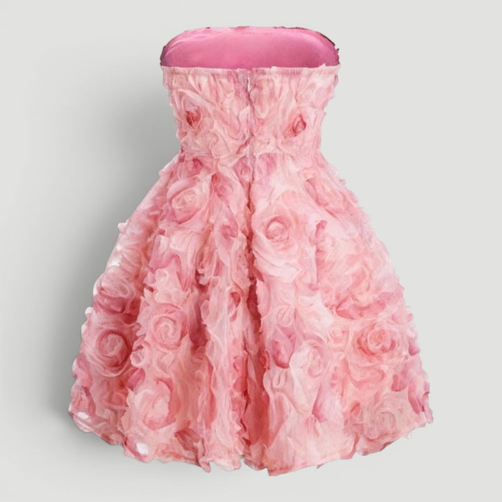Stylish pink strapless mini dress, a sophisticated women's party or special occasion dress.