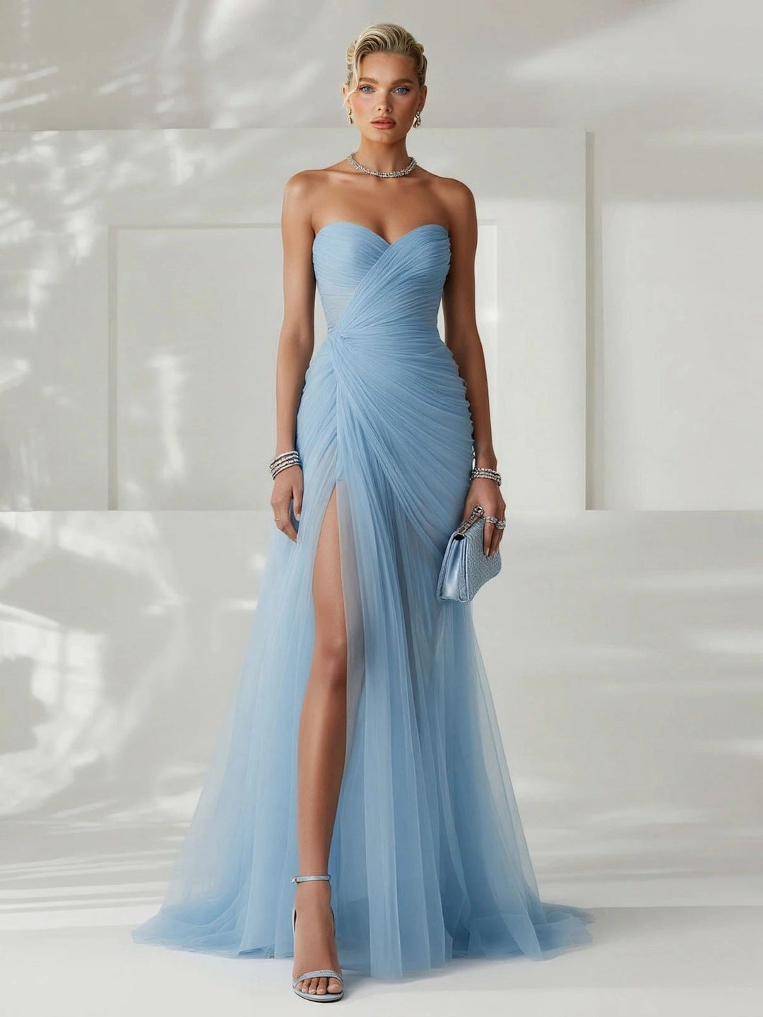 Elegant women's strapless pleated maxi dress for formal events and evening wear.