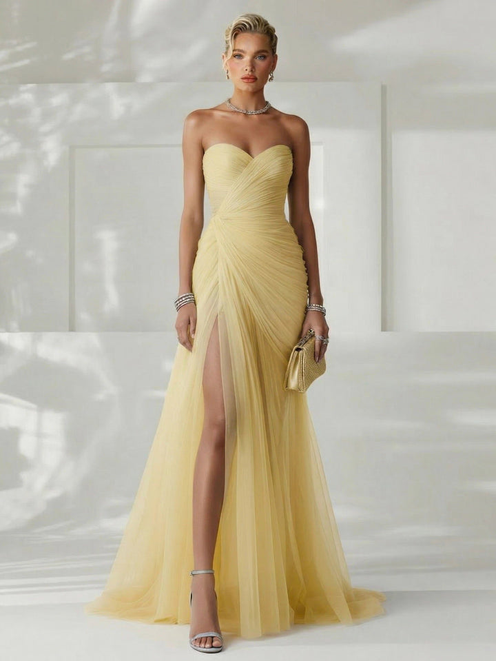 Pleated strapless maxi dress with sweetheart neckline, an elegant formal gown for women.