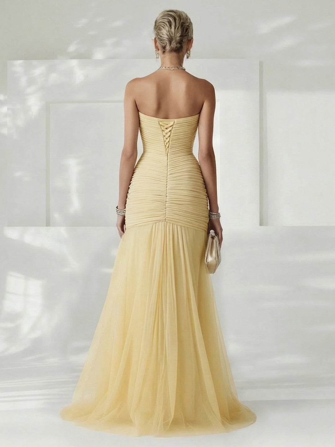 Long pleated strapless maxi dress for women, an elegant choice for formal parties and events.
