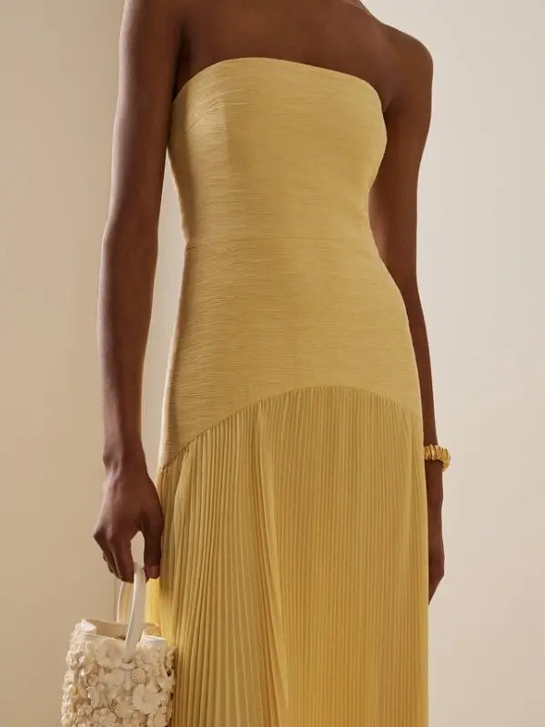 Women's strapless formal maxi dress. Elegant pleated evening gown, ideal for wedding guests & parties.