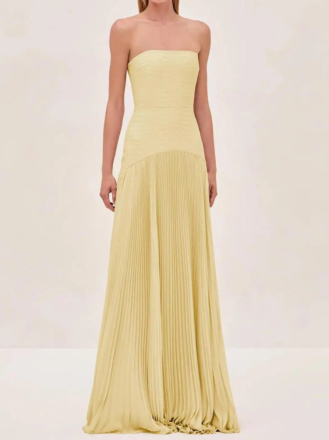 Sophisticated strapless evening gown for women. Pleated maxi dress, ideal for weddings & formal events.