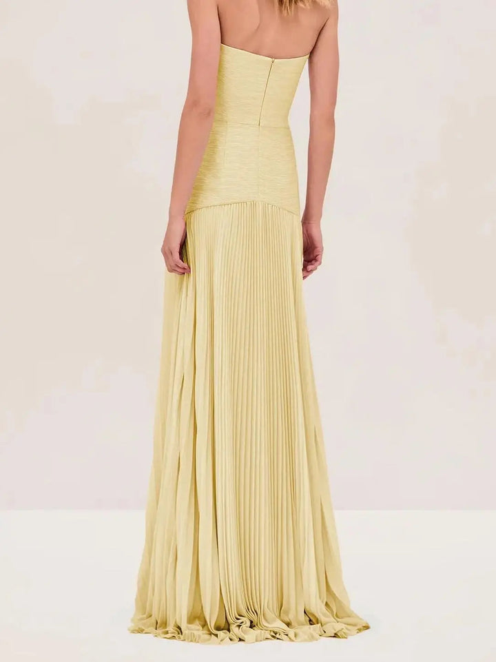 Women's elegant strapless pleated maxi dress. A stylish formal gown, perfect for special evening parties.