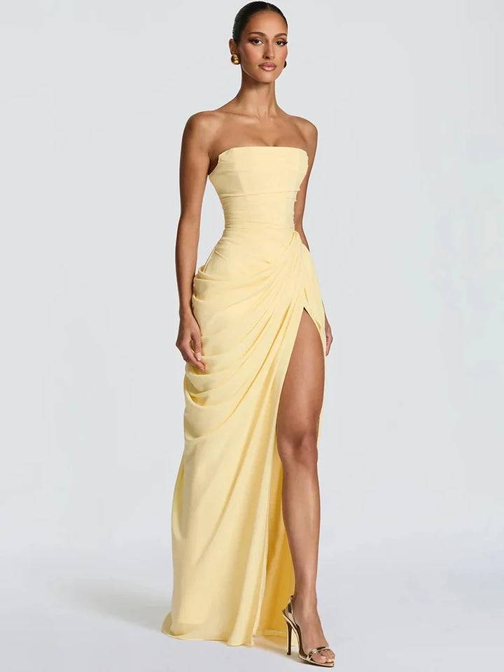 Stylish women's summer strapless maxi dress. Ruched detail & high slit, ideal for parties and special occasions.