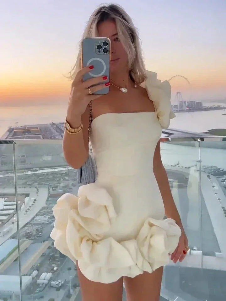 Stylish strapless ruffle mini dress, perfect for evening parties, cocktails, or special occasions.