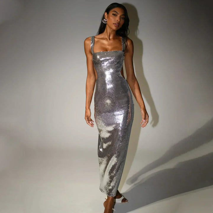 Elegant strapless sequin evening gown for women. A stunning long formal dress, perfect for wedding guests.