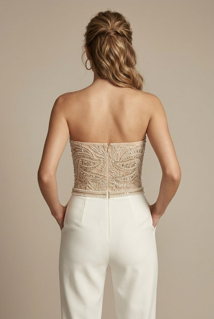 Tailored women's strapless jumpsuit in a chic design, offering a sleek straight leg and elegant sweetheart neckline.