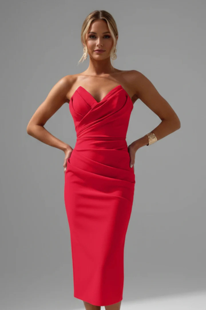 Women's fitted strapless midi dress featuring a sweetheart neckline & elegant side ruching. Cocktail ready.