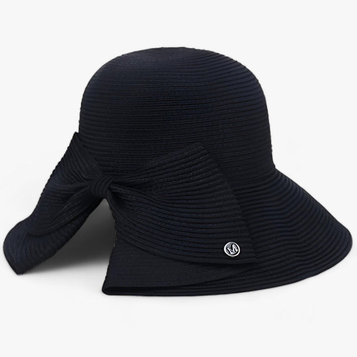 Stylish women's straw beach hat with an asymmetrical bow, offering excellent sun protection for summer fashion.