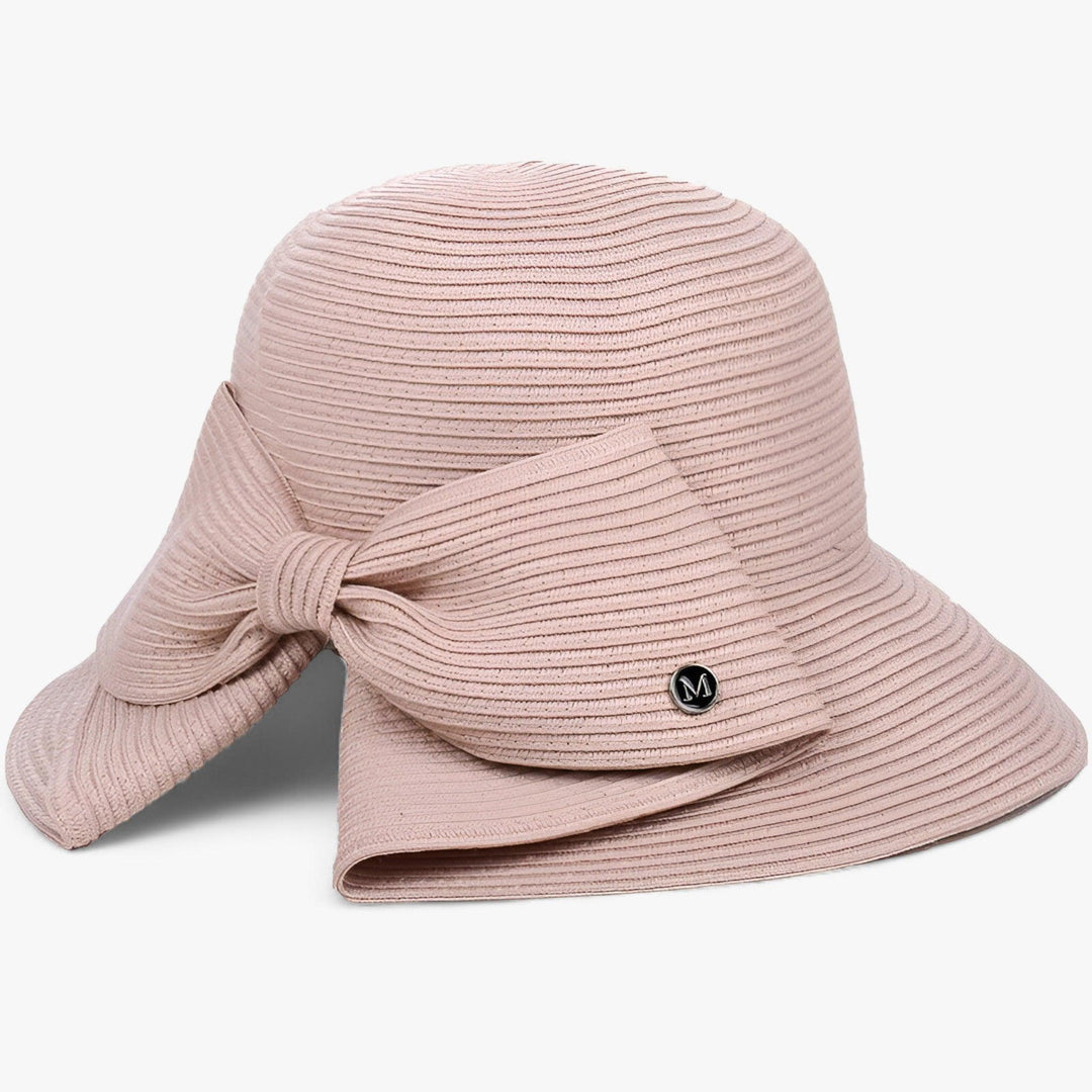 Women's straw sun hat featuring a trendy asymmetrical bow, perfect for adding elegance to your summer outfits.