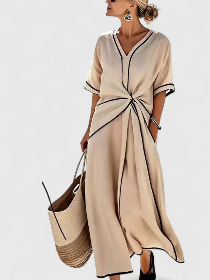 Elegant women's striped midi dress, perfect for summer vacations. Lightweight & flowy for chic comfort.