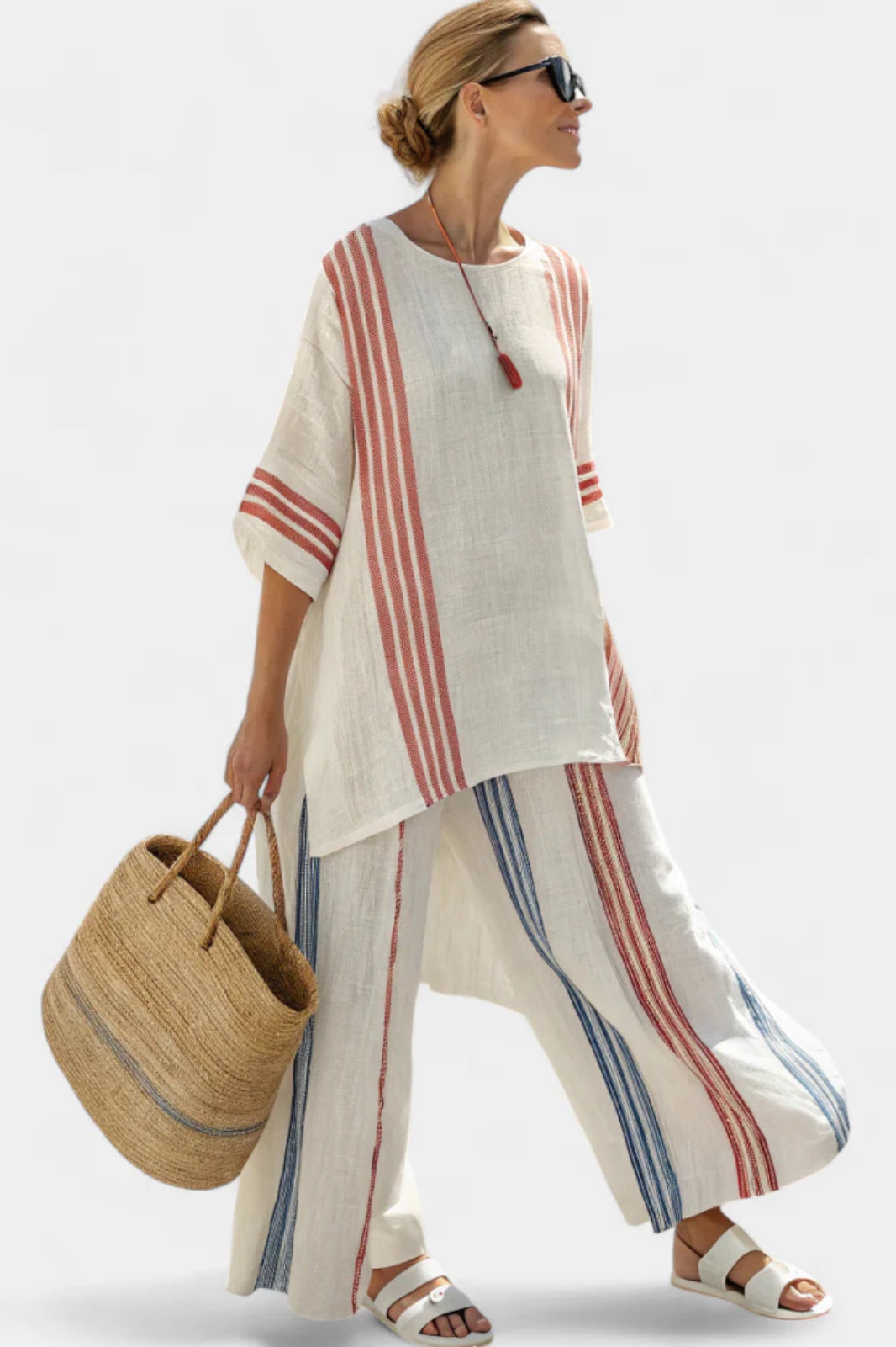 Versatile women's striped top & high-waisted trousers two-piece set, ideal for casual wear or travel fashion.