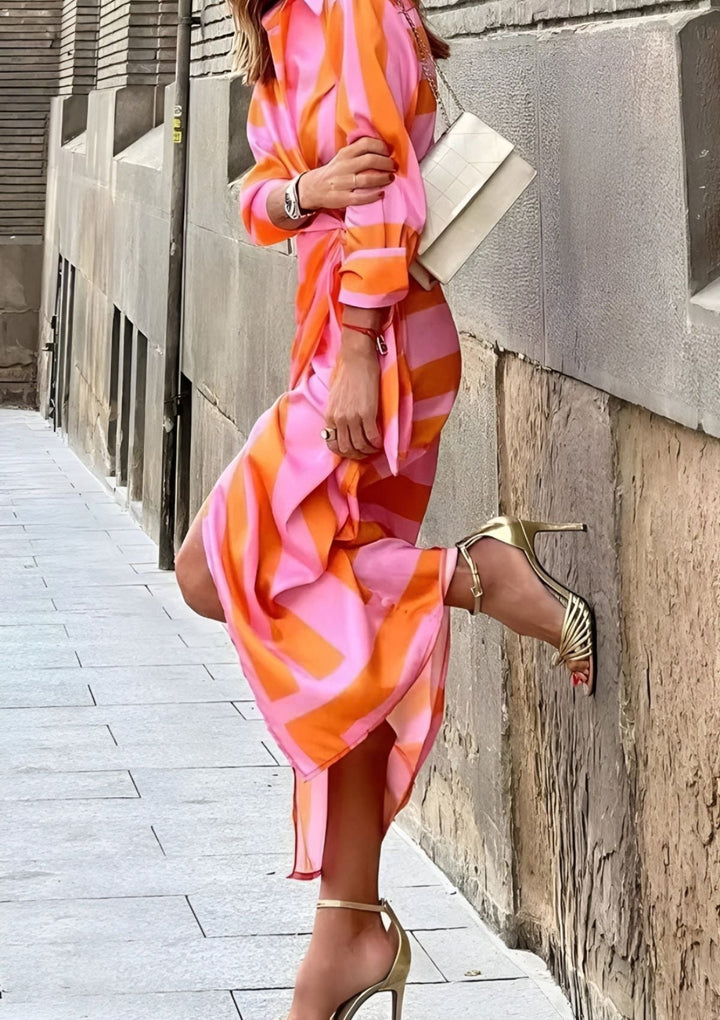 Elegant striped midi dress for women, featuring a comfortable wrap style.