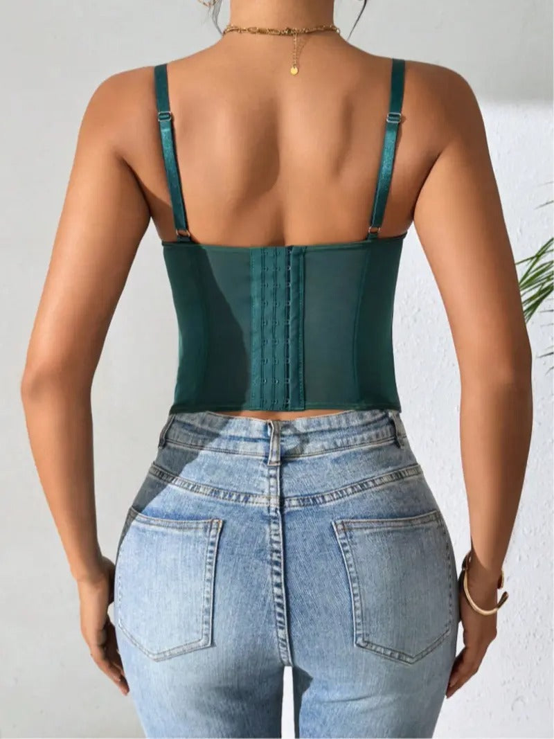 Women's backless bustier top, a luxurious statement piece with elegant structure & fitted design for special occasions.