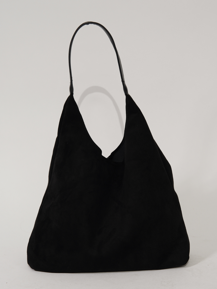 Back view of elegant women's suede tote bag. Versatile everyday shoulder bag, ideal for daily essentials.