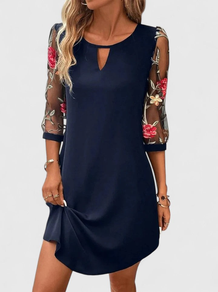 Elegant women's summer dress for special occasions. Flowy, sophisticated party wear in a timeless design.