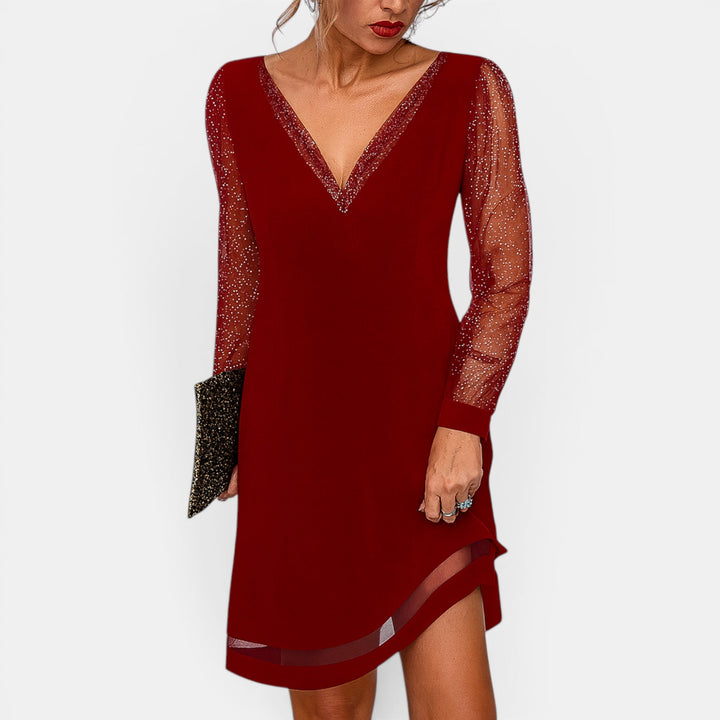 Chic ladies fashion midi dress, elegant v-neck design offers flattering comfort for any summer occasion.