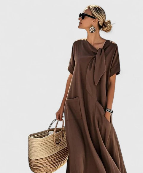 Elegant women's summer midi dress with stylish tie neck. Perfect for chic casual or vacation wear.