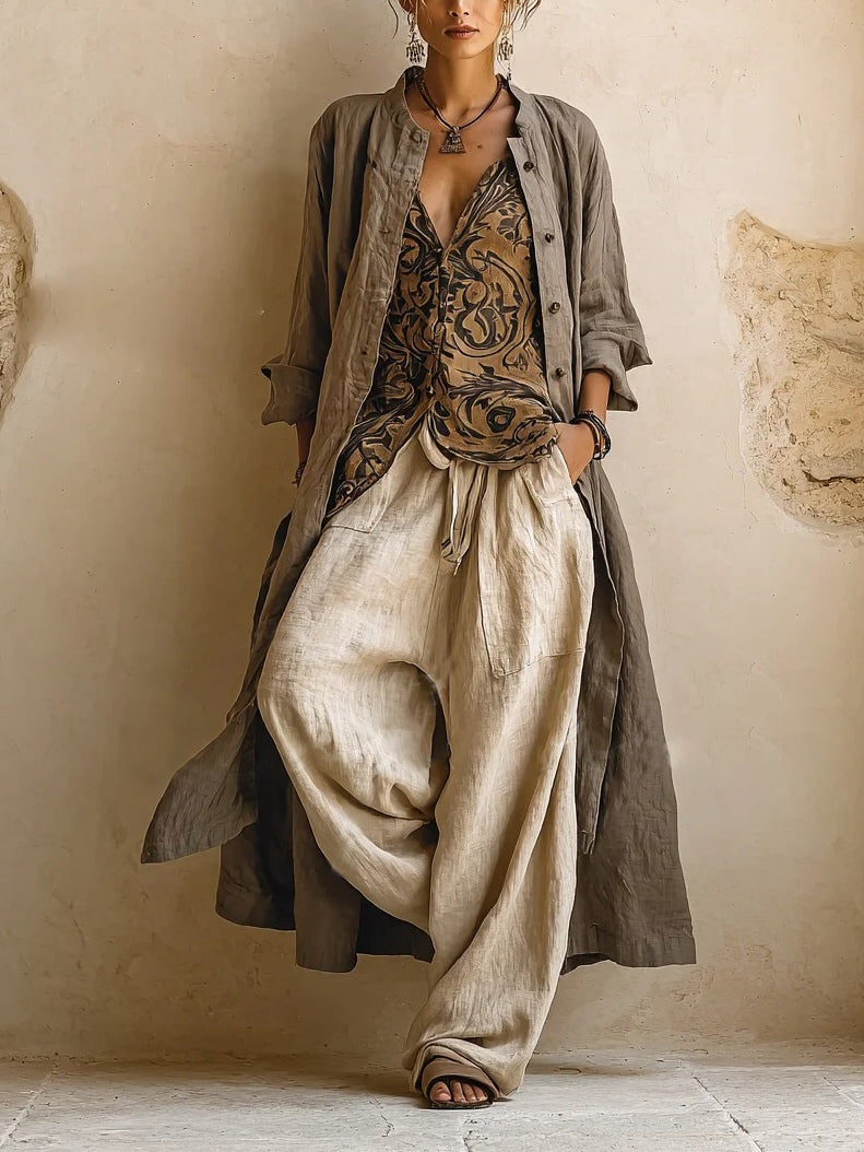 Elegant women's summer three-piece set: comfortable top, shorts, & kimono. Perfect versatile casual outfit for travel.