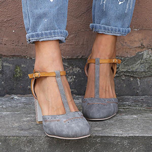 Fashionable women's T-strap high heels. Elegant party shoes with comfortable straps, ideal for a chic look.