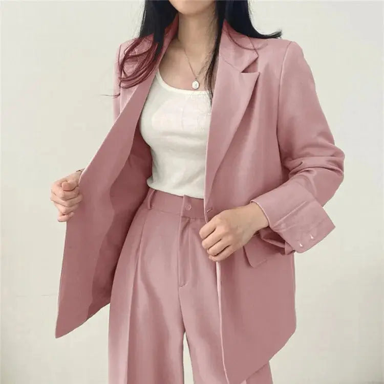 Professional women's two-piece blazer & trouser suit, ideal for office chic and smart casual style.
