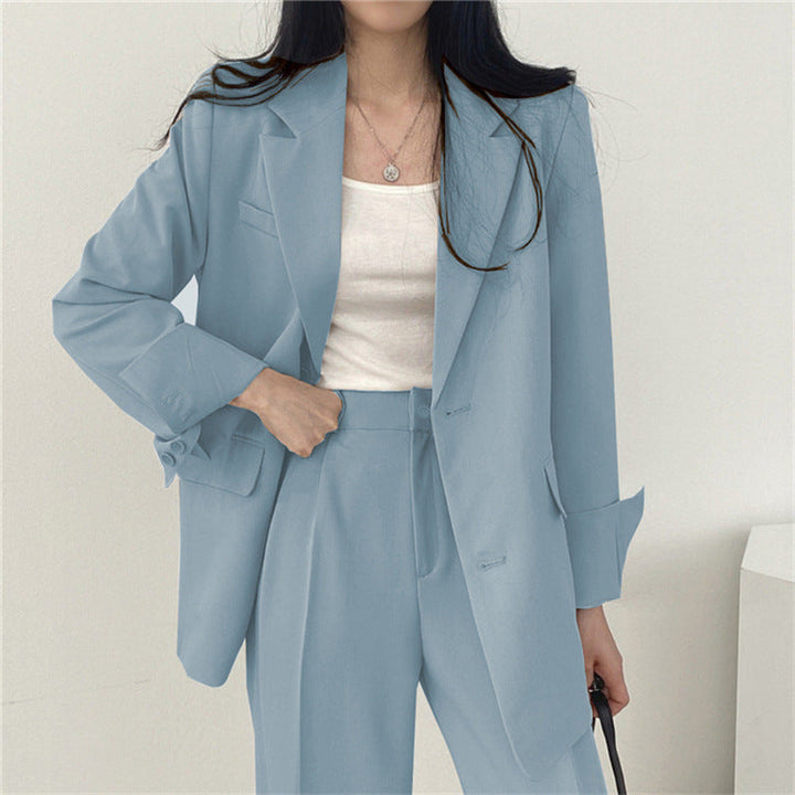 Women's professional two-piece: a refined tailored blazer and comfortable relaxed fit trousers.
