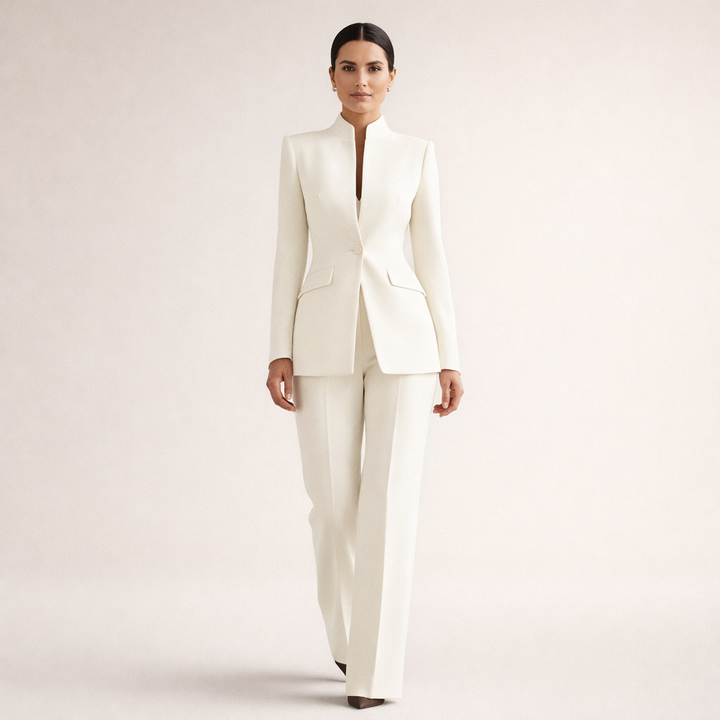 Sophisticated women's tailored suit, versatile for professional wear & formal occasions. Collarless jacket & pants.