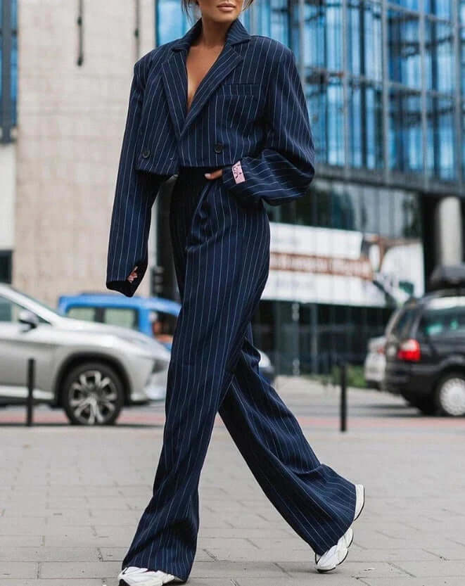 Sophisticated women's two-piece outfit, showcasing a chic, elegant design suitable for work or events.