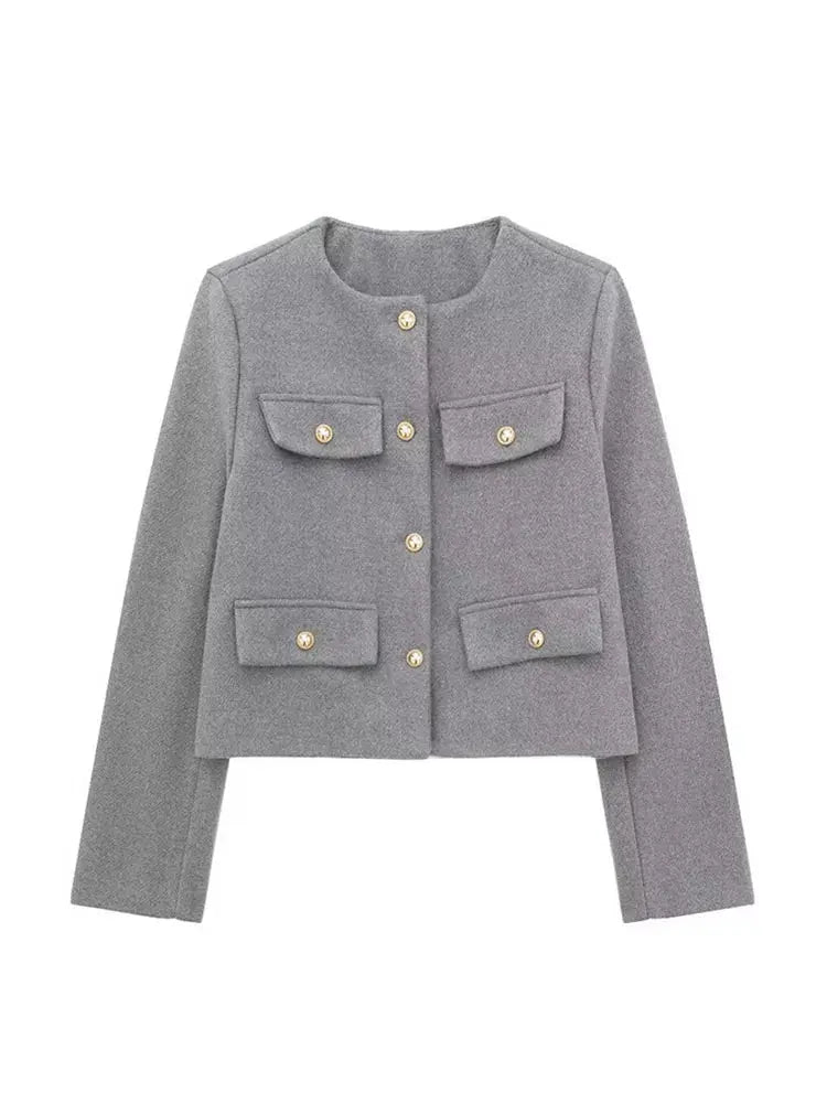 Navy chic textured cropped jacket for women, a modern button-up outerwear piece.