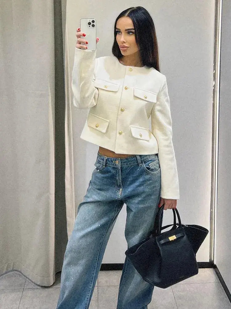 Modern round neck cropped button-up jacket for women. Elegant & versatile everyday style.