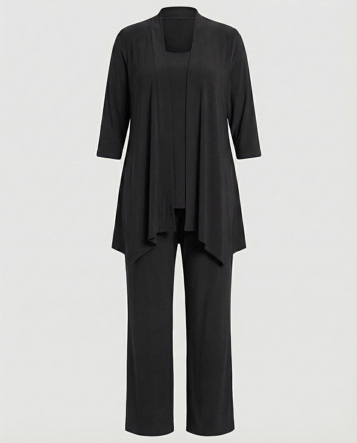 Well-tailored women's elegant three-piece pantsuit, offering a sophisticated & professional silhouette.