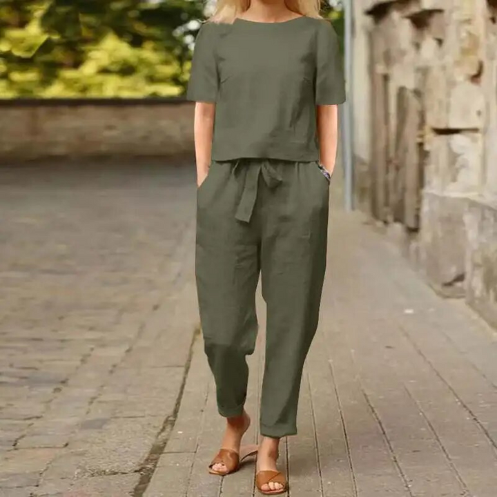 Coordinated women's two-piece summer set with a tie-waist, embodying casual elegance for spring fashion.
