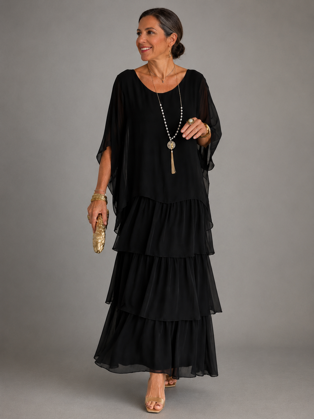 Elegant women's tiered ruffle maxi dress with batwing sleeves, perfect for summer parties.