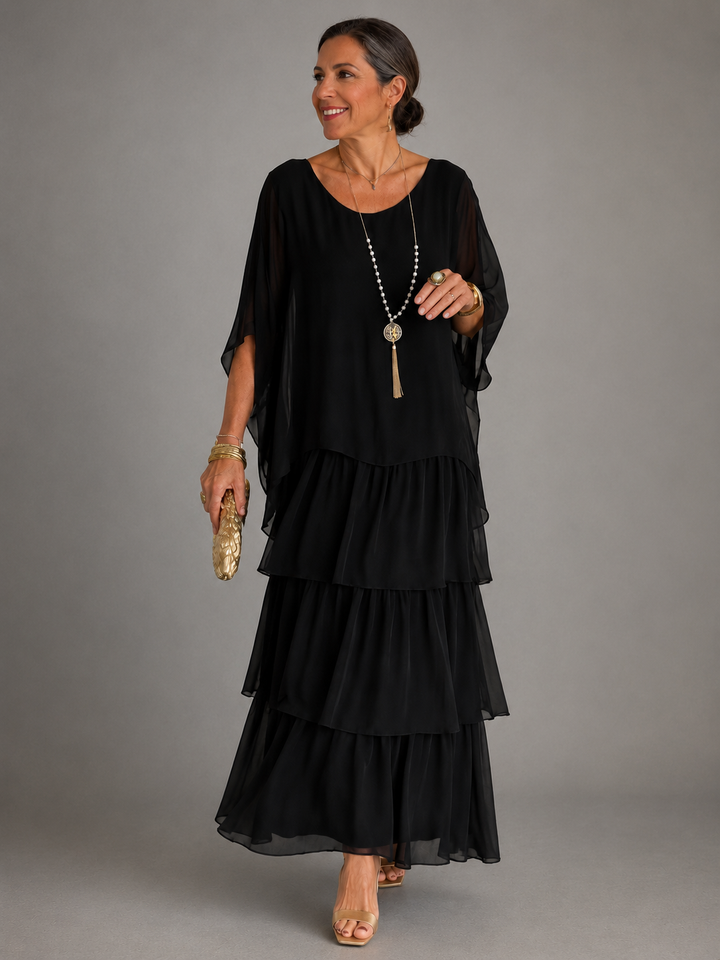 Elegant women's tiered ruffle maxi dress with batwing sleeves, perfect for summer parties.