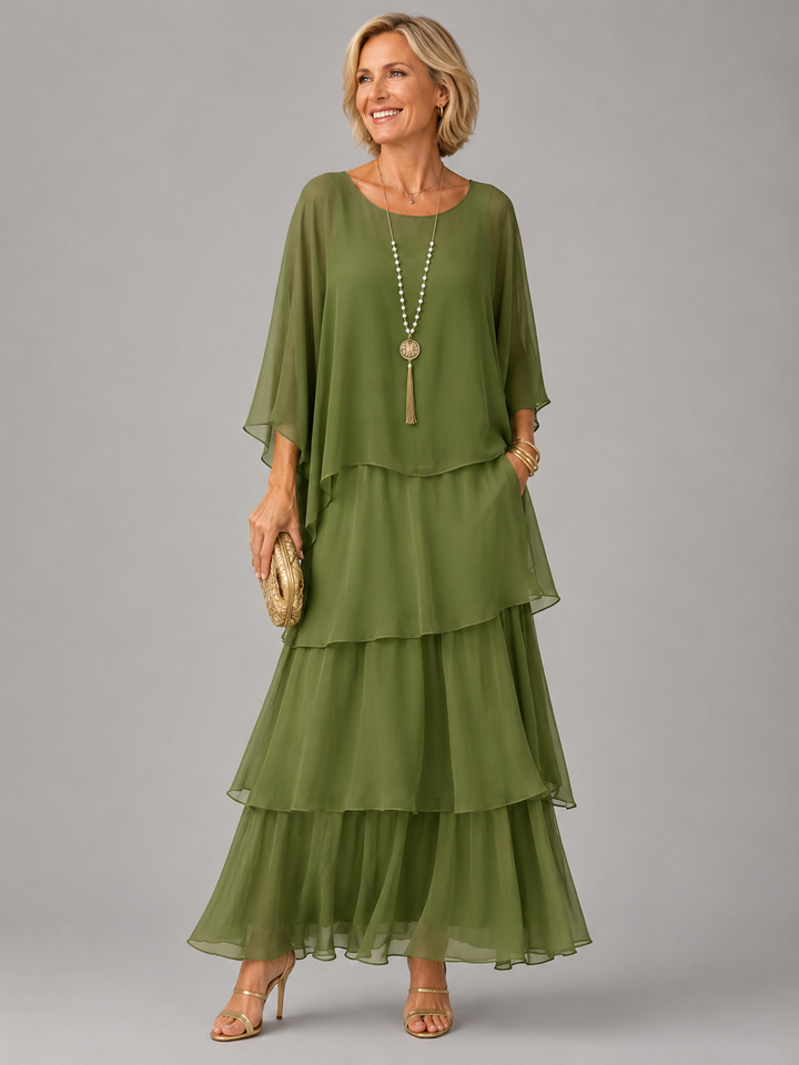 Flowy women's batwing sleeve maxi dress, tiered ruffles and round neck, comfortable casual wear.