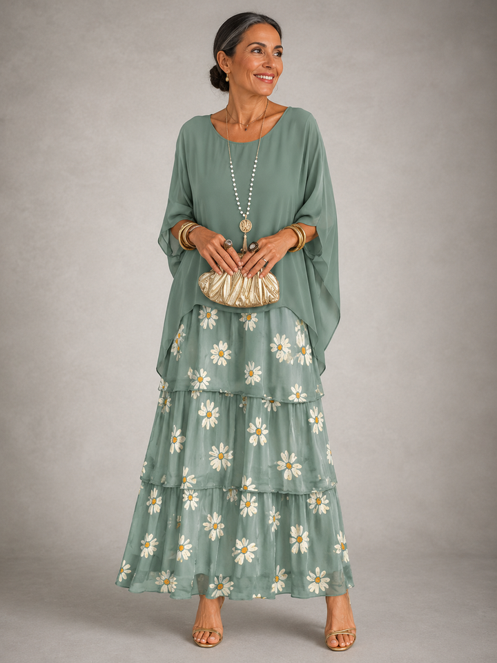 Summer-ready women's flowy tiered maxi dress with batwing sleeves, elegant & loose fit.