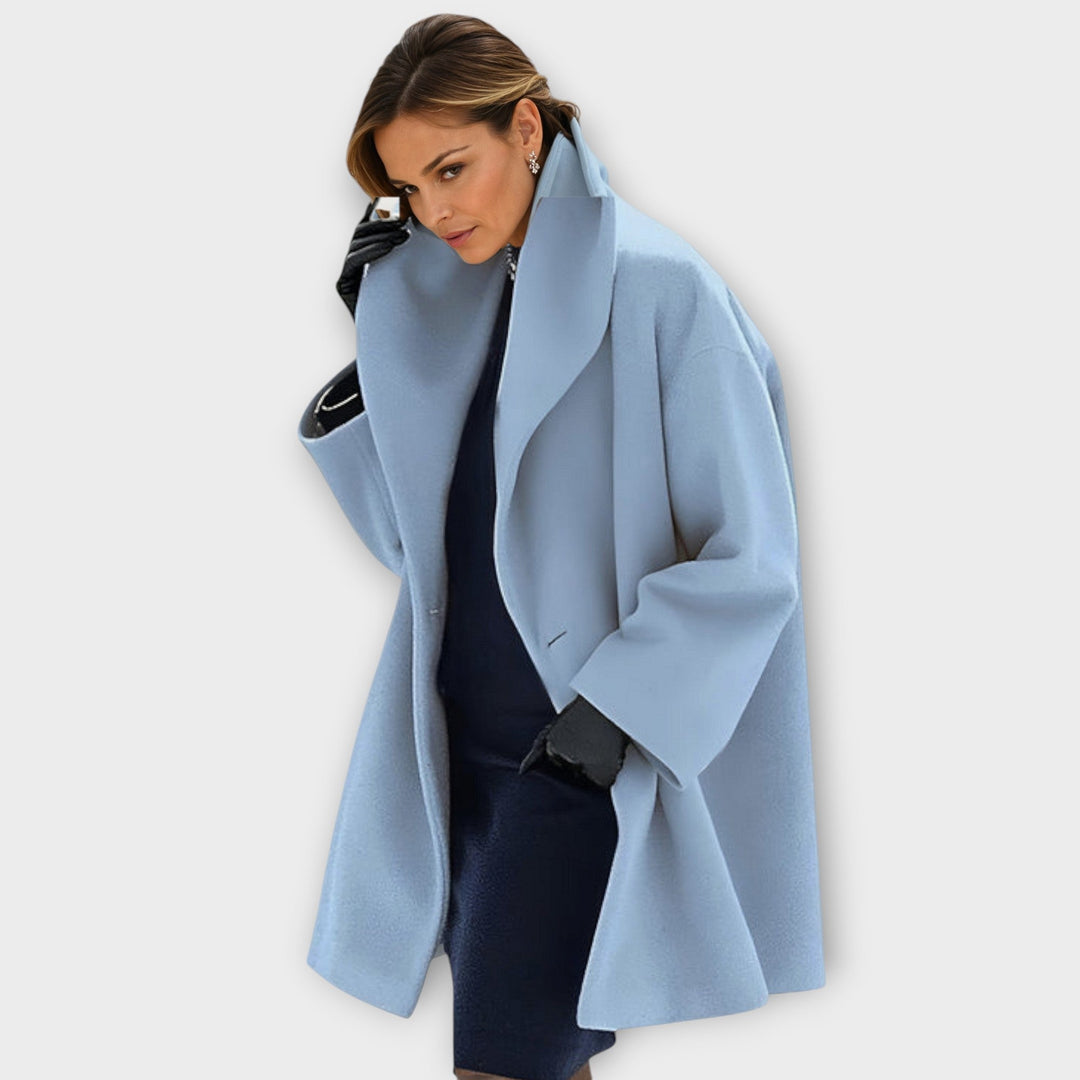 Close-up of the elegant women's transitional jacket, showing premium fabric and classic detailing.