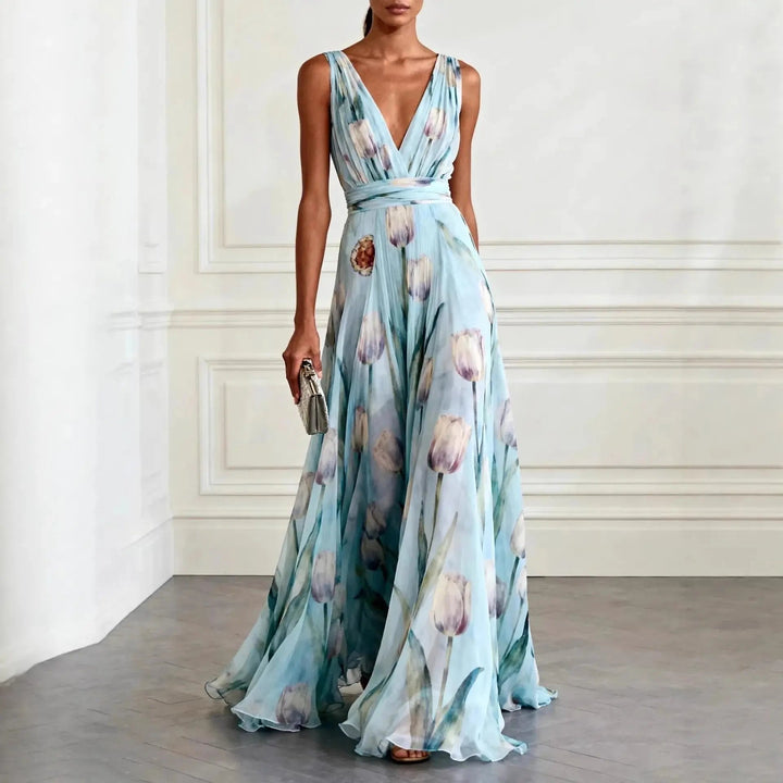 Elegant women's tulip print maxi wrap dress with V-neck, flowing fabric. Perfect formal occasion wear or wedding guest attire.
