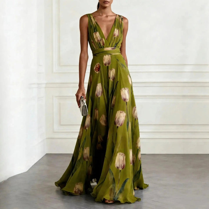 Women's elegant tulip print V-neck maxi wrap dress. Flowing formal occasion wear. Perfect for wedding guests or holidays.